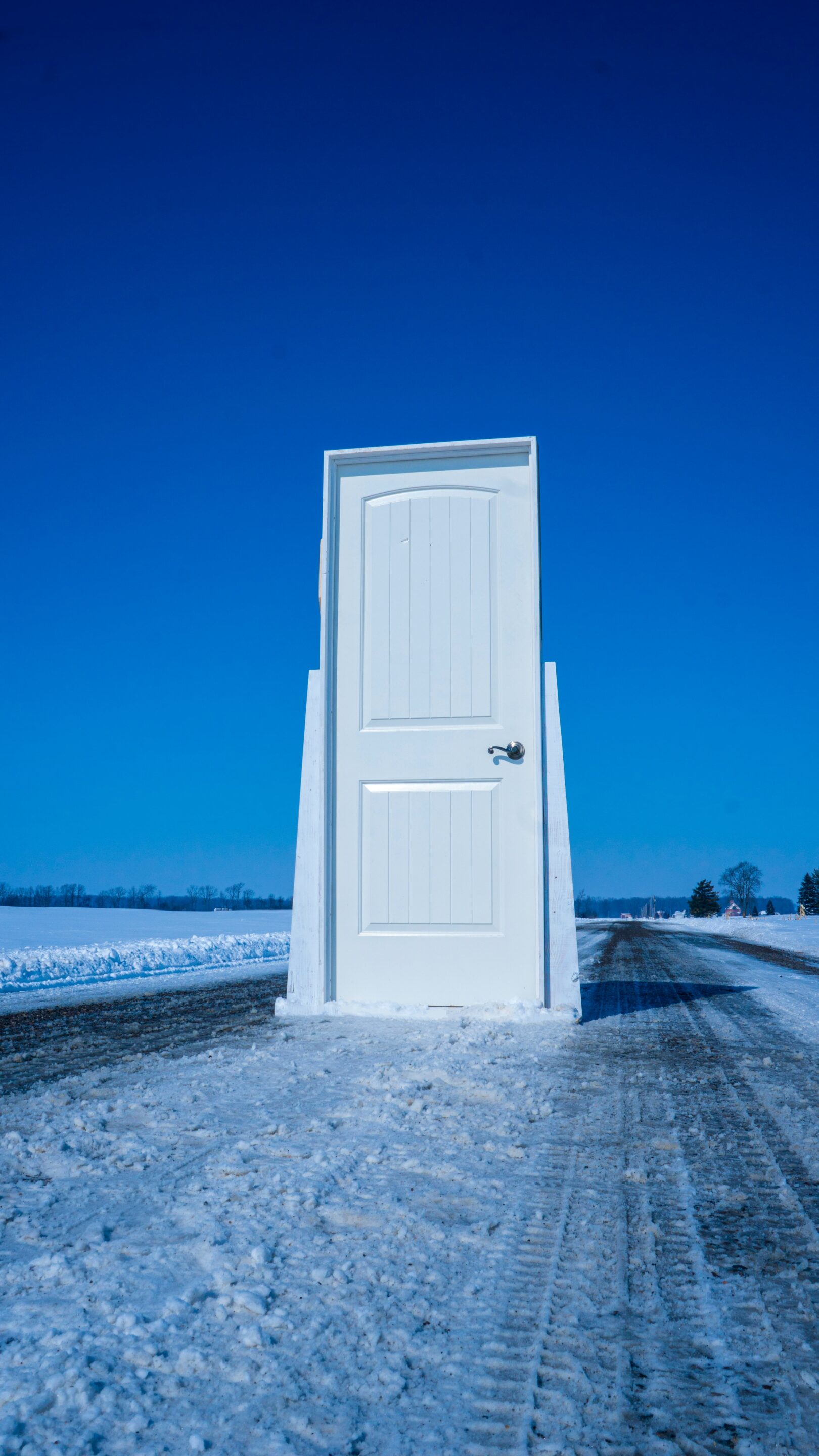 Image of a door with a blue sky in the background advertising using EFT to work with metaphors